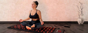 Earthing grounding pad on the floor during meditation.