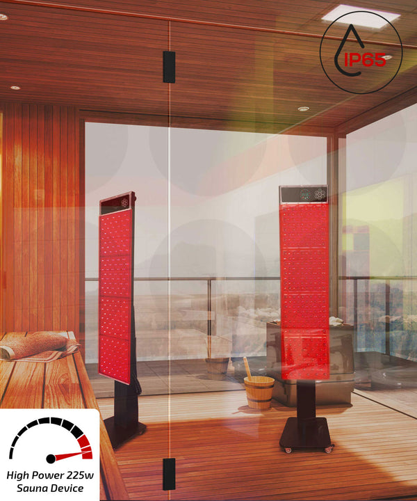 Two red light therapy panels on stands in wooden floor sauna with cityscape in the background.