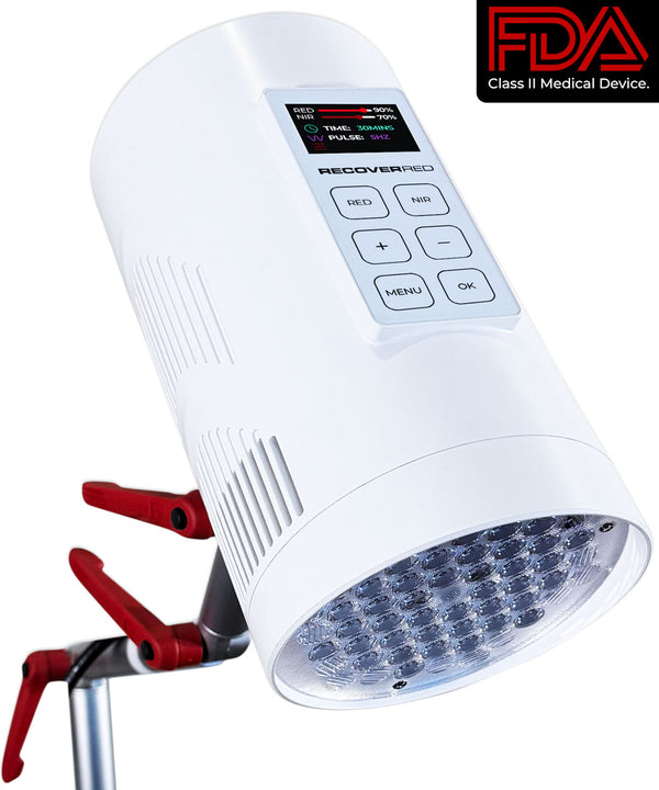 Red LED light therapy device with red clamps on a metal frame.